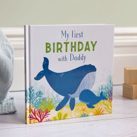 My First Birthday With Daddy picture book on white wooden floor with wooden building blocks